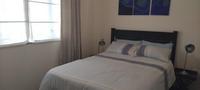 Fully Furnished Top-Floor Apartment with Stunning Beachfront Location