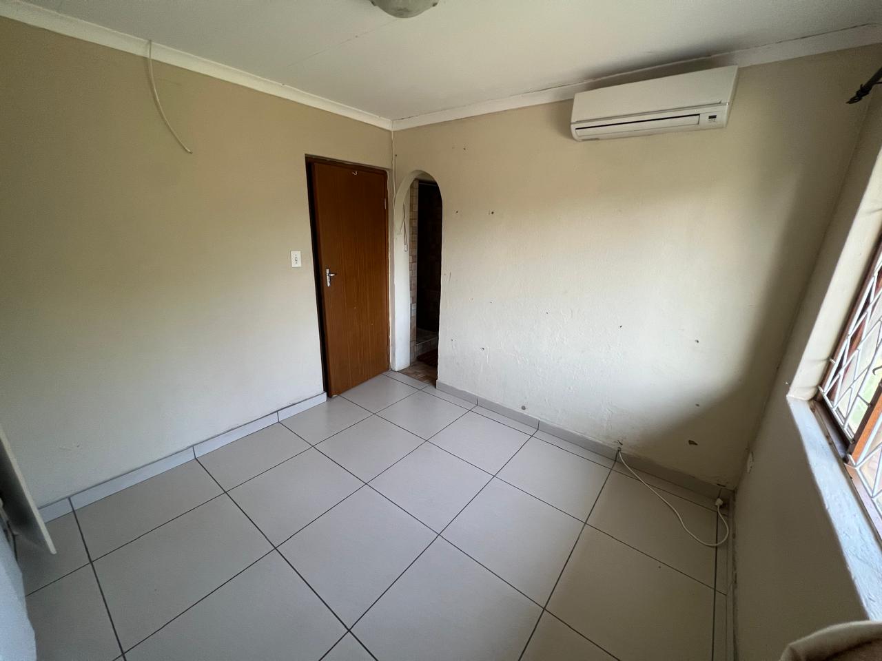SPACIOUS FAMILY HOME WITH ADDITIONAL COTTAGE IN UVONGO